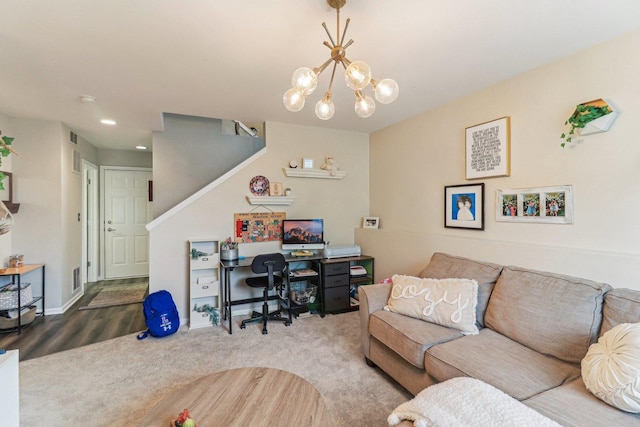 carpeted living room featuring visible vents, a notable chandelier, and baseboards