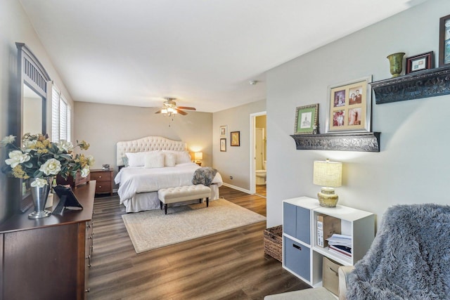 bedroom with dark wood-type flooring, a ceiling fan, and baseboards