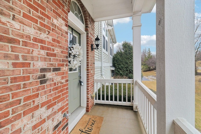 balcony featuring a porch