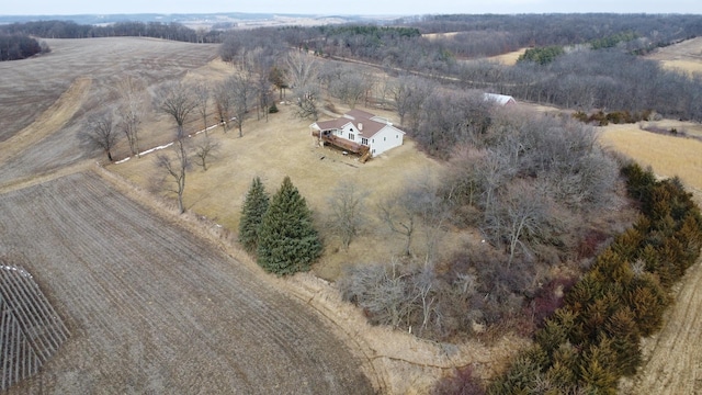 birds eye view of property with a rural view