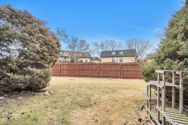 view of yard with fence