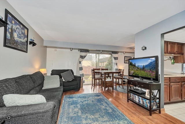 living area with light wood-style floors