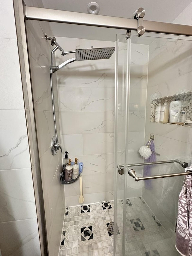 full bathroom with a shower stall