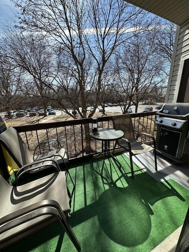 balcony featuring area for grilling