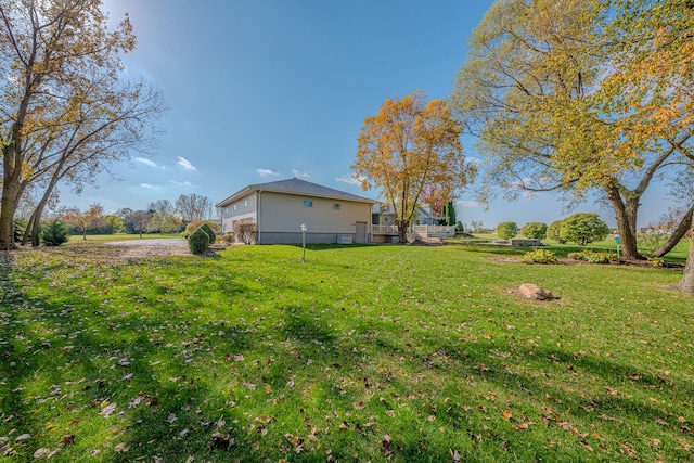 view of yard with a garage