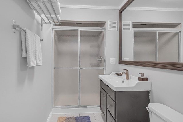 bathroom featuring vanity, visible vents, a stall shower, tile patterned flooring, and toilet