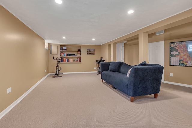 living room with recessed lighting, visible vents, and baseboards