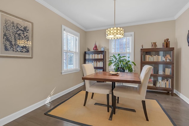 dining area with a wealth of natural light, dark wood finished floors, and crown molding