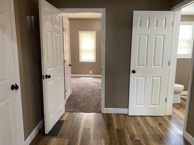 225 W Dakota St, Spring Valley, IL 61362 - corridor with dark wood-style floors and baseboards