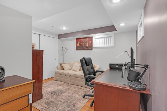 office space with recessed lighting and wood finished floors