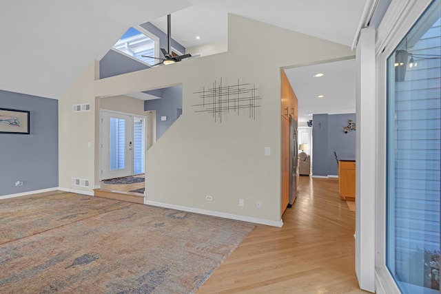 interior space featuring visible vents, french doors, baseboards, and ceiling fan