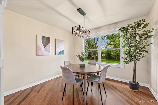 924 Colony Lake Dr, Schaumburg, IL 60194 - dining space with a chandelier and wood finished floors