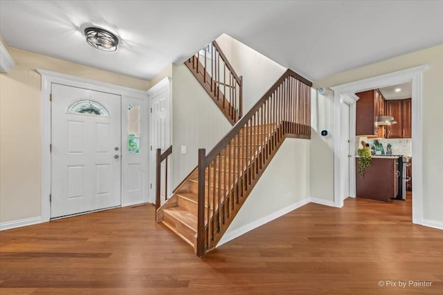 924 Colony Lake Dr, Schaumburg, IL 60194 - entryway featuring wood finished floors and stairs