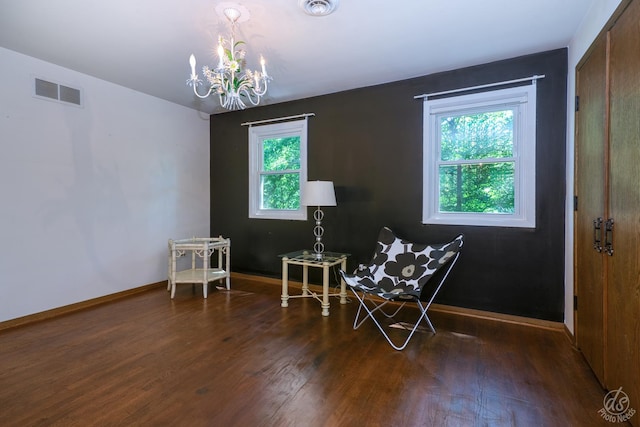 14930 W Wadsworth Rd, Wadsworth, IL 60083 - living area with hardwood / wood-style flooring and a chandelier