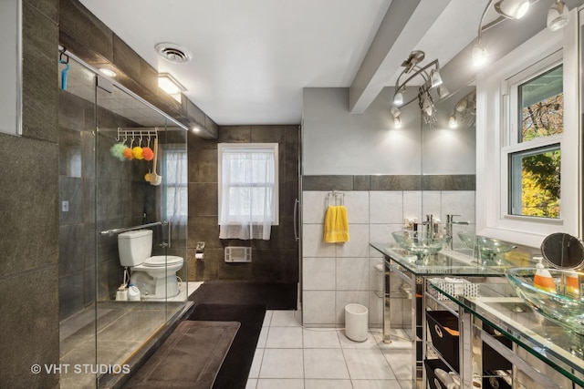 14930 W Wadsworth Rd, Wadsworth, IL 60083 - bathroom featuring tile walls, tile patterned floors, a stall shower, and vanity