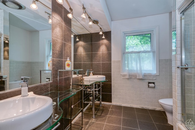 14930 W Wadsworth Rd, Wadsworth, IL 60083 - bathroom featuring tile walls, tile patterned floors, and wainscoting
