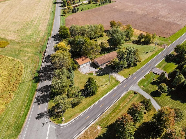 birds eye view of property featuring a rural view