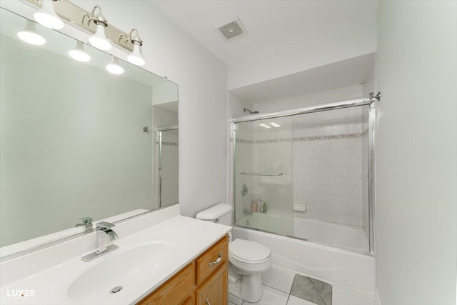 full bath with enclosed tub / shower combo, tile patterned flooring, toilet, vanity, and visible vents