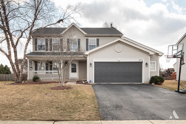 view of front facade with a garage, covered porch, a front lawn, and aphalt driveway