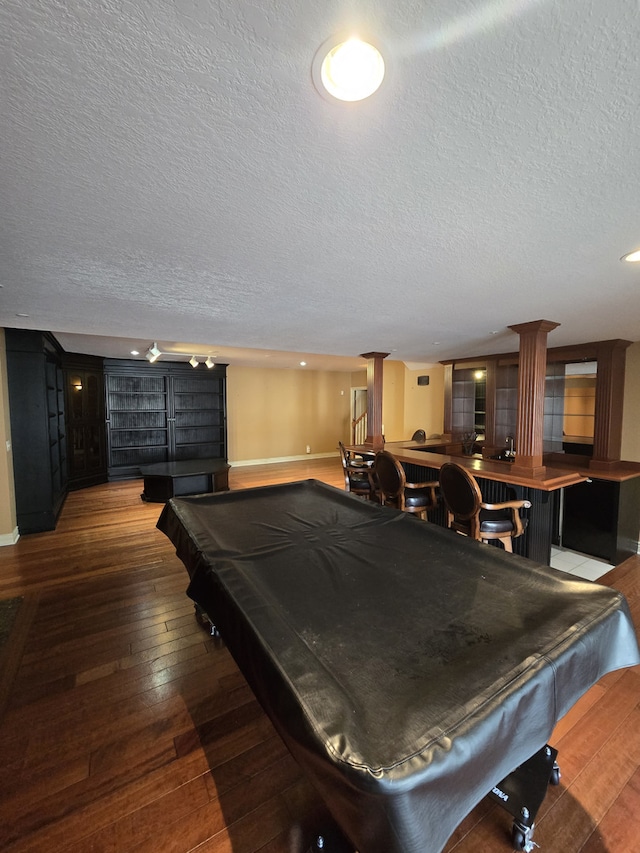 rec room with baseboards, billiards, hardwood / wood-style flooring, and ornate columns