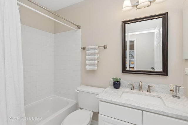 full bathroom with toilet, shower / bath combo with shower curtain, and vanity