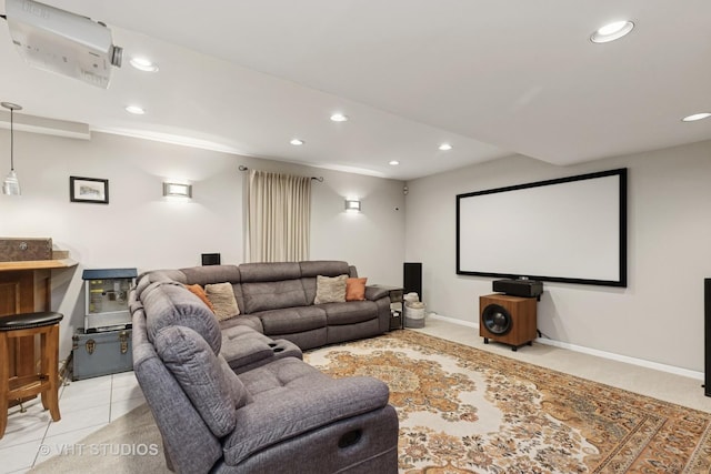 home theater room featuring baseboards, an AC wall unit, light carpet, and recessed lighting