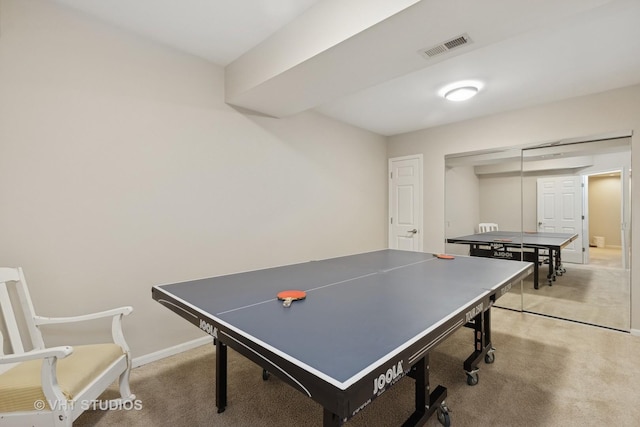 playroom featuring light carpet, visible vents, and baseboards