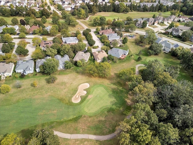 drone / aerial view with a residential view and view of golf course