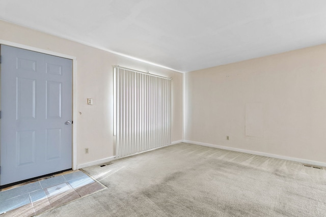 interior space featuring visible vents and baseboards