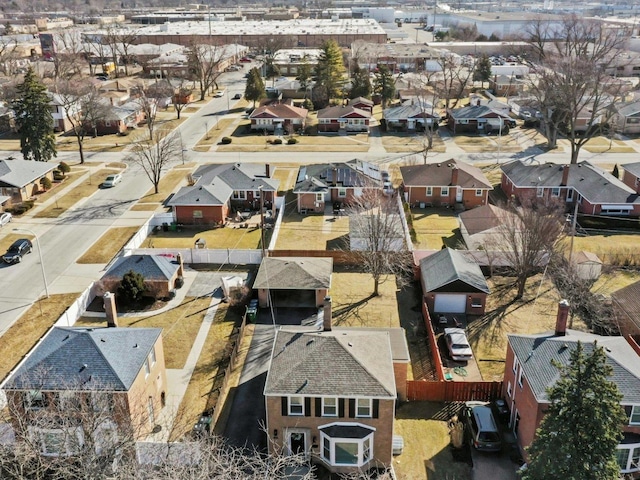 birds eye view of property with a residential view