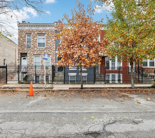 2655 W 24th Pl, Chicago, IL 60608 - multi unit property with a fenced front yard and stone siding