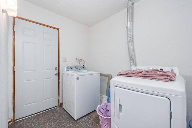 washroom with laundry area and washing machine and clothes dryer