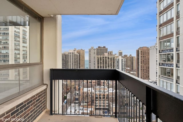 balcony featuring a view of city