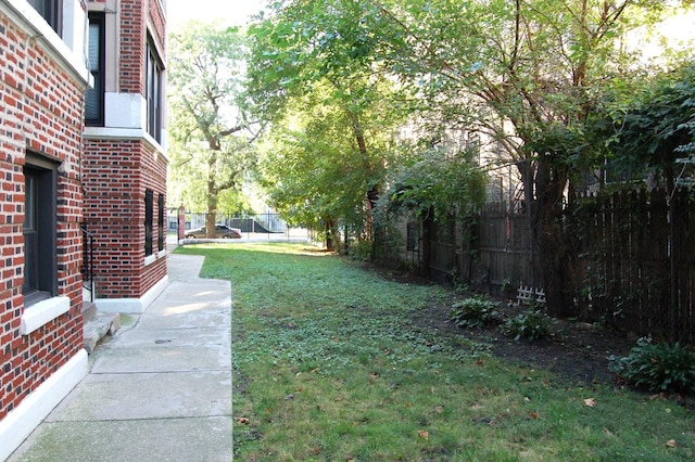 view of yard with a fenced backyard