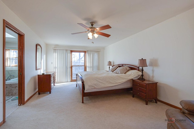 bedroom with light carpet, baseboards, and a ceiling fan