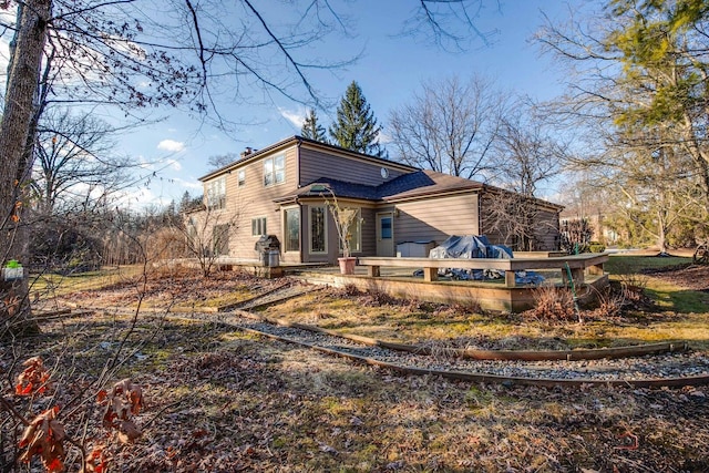 exterior space featuring a wooden deck