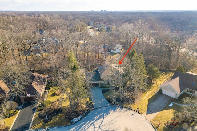 bird's eye view featuring a view of trees