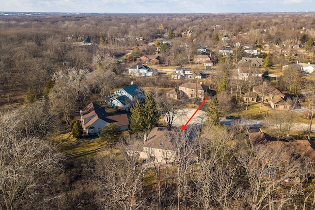 birds eye view of property with a residential view