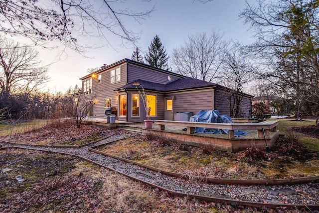 view of front of home featuring a wooden deck