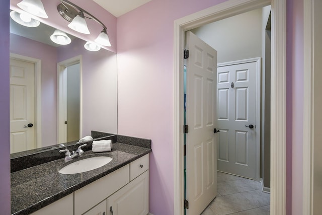 bathroom with vanity and tile patterned floors