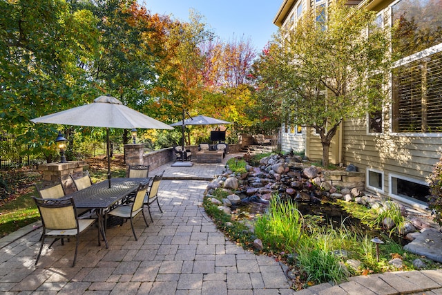 view of patio with outdoor dining area