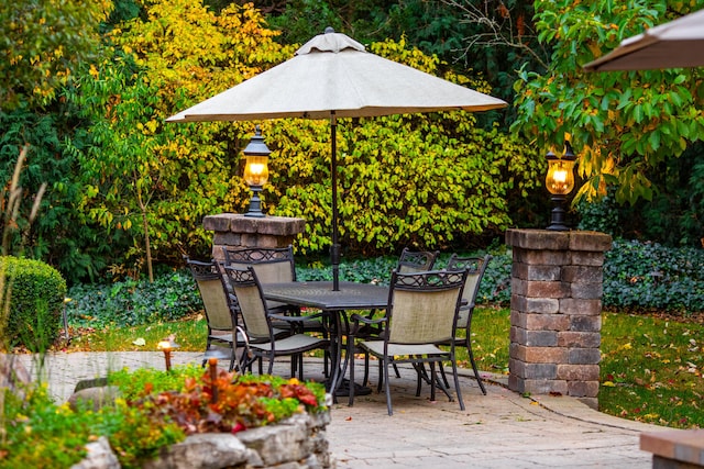 exterior space with outdoor dining space and a patio area