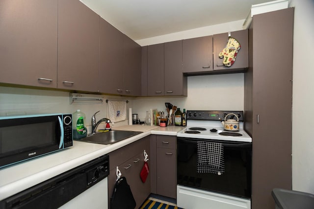 655 W Irving Park Rd Unit 909, Chicago, IL 60613 - kitchen with white appliances, a sink, and light countertops