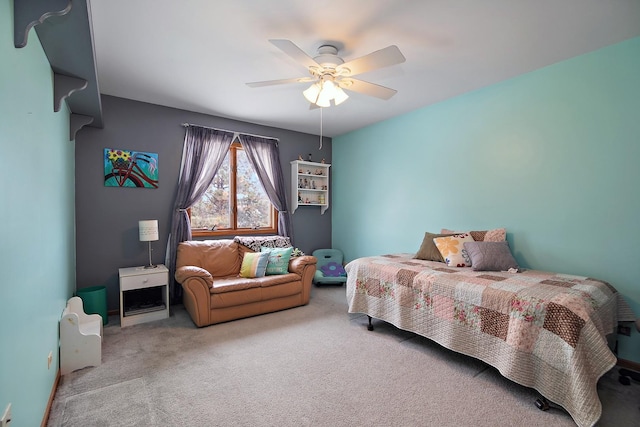 carpeted bedroom featuring a ceiling fan