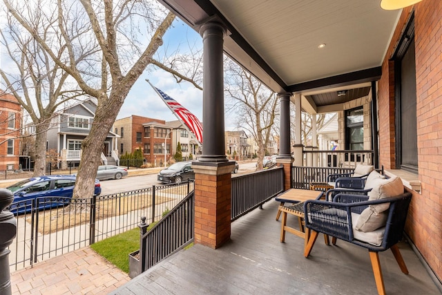 view of patio featuring a porch