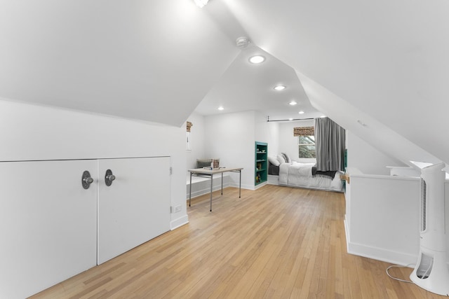 bonus room with lofted ceiling, baseboards, light wood-style flooring, and recessed lighting