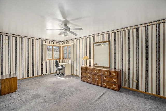 interior space with baseboards, carpet, and wallpapered walls