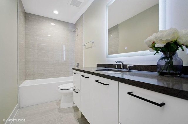 full bath featuring toilet, vanity, visible vents, tub / shower combination, and tile patterned floors