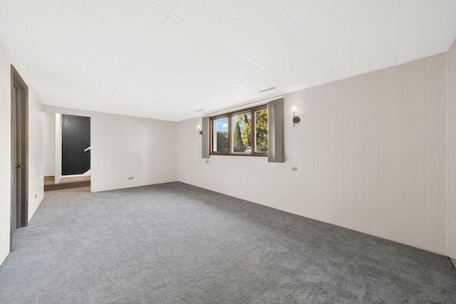 unfurnished room featuring carpet flooring