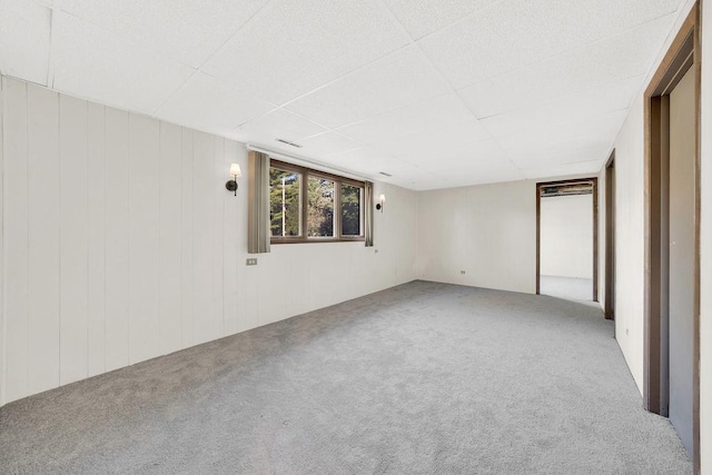 unfurnished room featuring carpet flooring